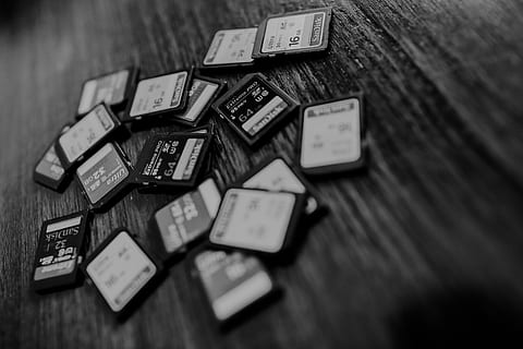 memory cards, sd cards, sandisk, table, selective focus, wood - material HD wallpaper