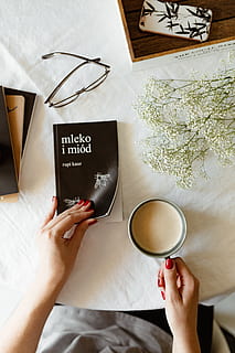 Woman read book and drink coffee, hands, relaxing, reading, time HD wallpaper