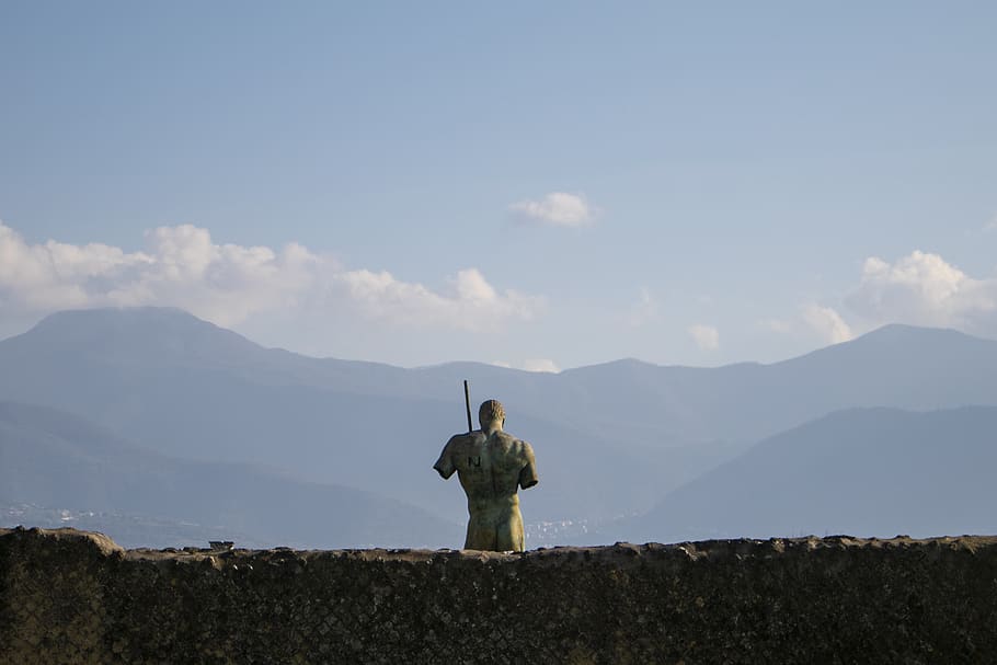 man standing behind wall, mountain, sky, beauty in nature, scenics - nature HD wallpaper