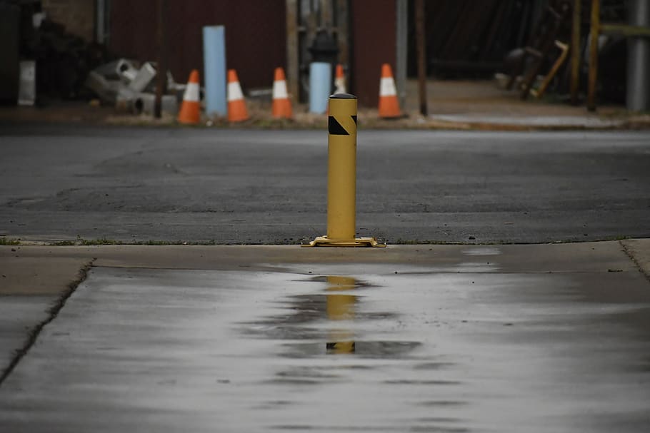 asphalt, tarmac, cone, puddle, road, hand, person, human, machine HD wallpaper