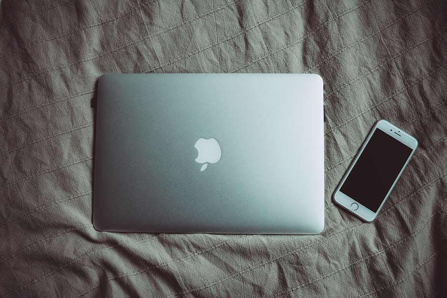 Silver Macbook Beside Silver Iphone 6, apple, bed, cellphone HD wallpaper