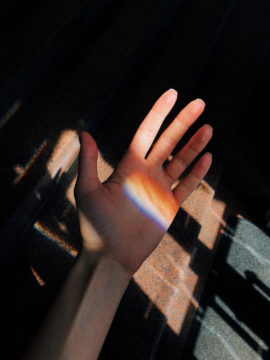 Left Person's Palm Near Brown Metal Panel, black background, close-up HD wallpaper