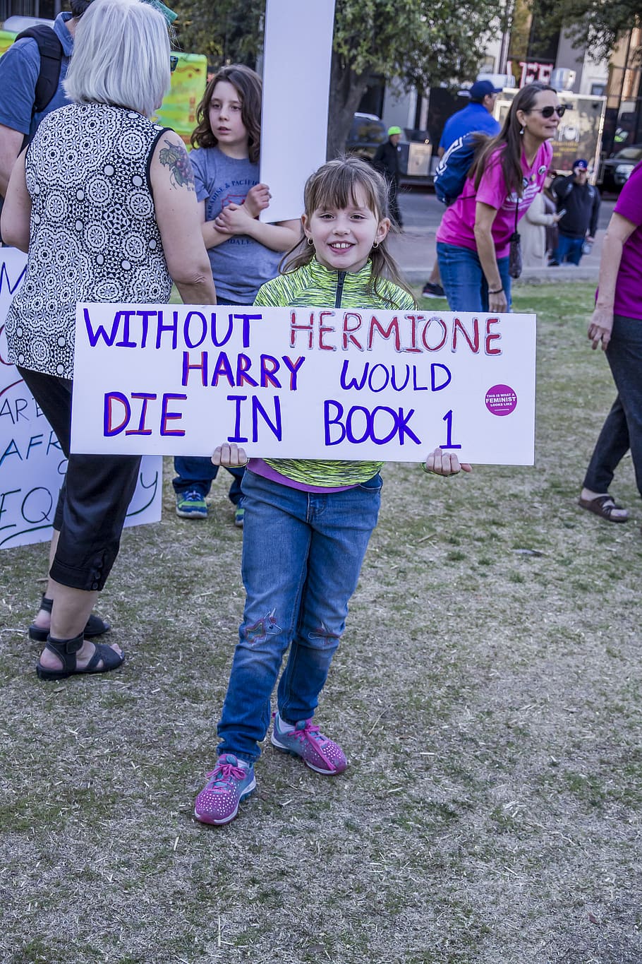 girl standing while holding without Hermione Harry would die in book 1 sign, HD wallpaper