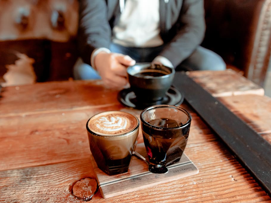 cappuccino on coffee table, cup, coffee cup, human, person, latte HD wallpaper