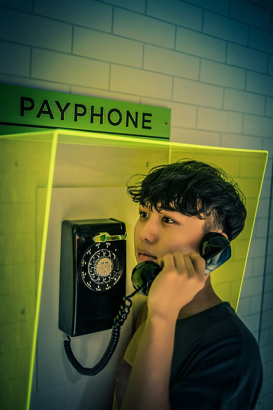 Man Holding Black Rotary Payphone, boy, close-up, communication HD wallpaper