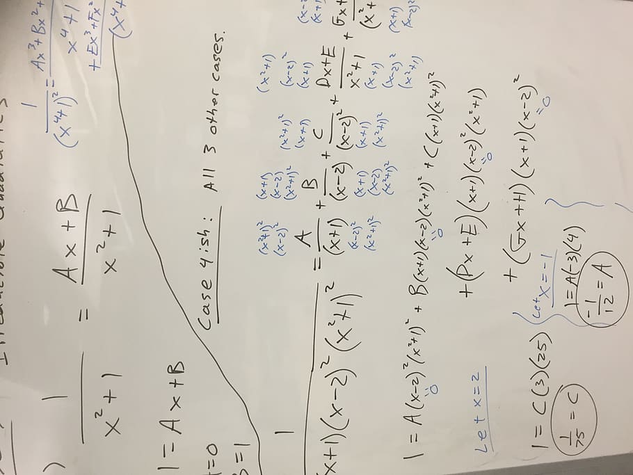 Algebra equations on a whiteboard., teaching, education, math
