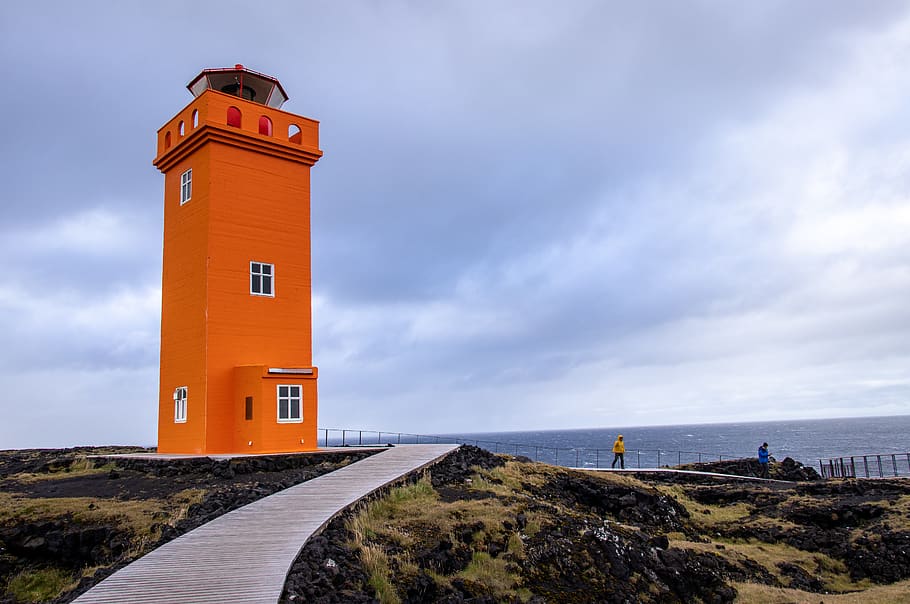 orange lighthouse, sea, sky, cloud - sky, architecture, water HD wallpaper
