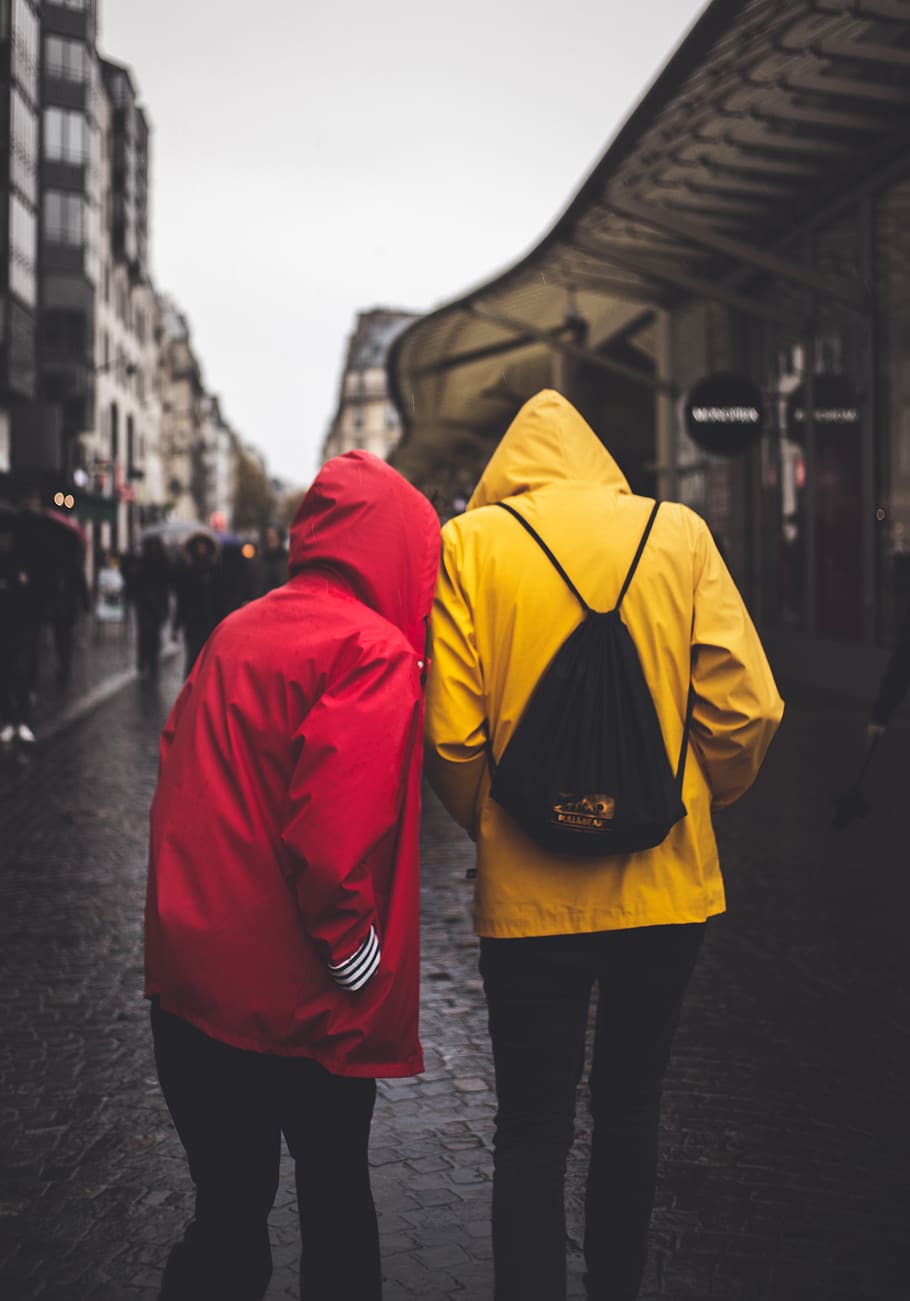 two people in yellow and red hoodies in middle of road, clothing, HD wallpaper