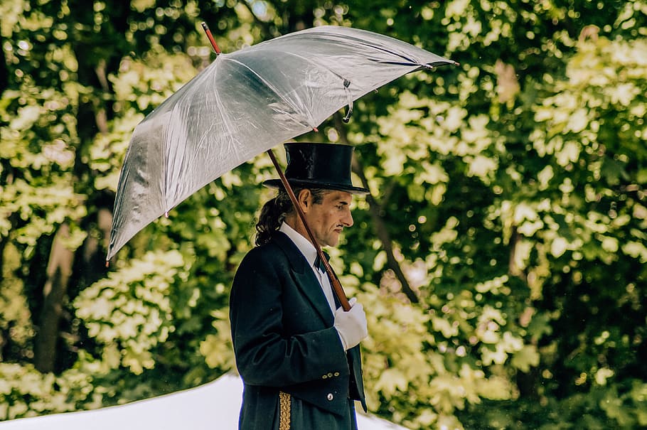 Man Holding Umbrella, adult, black, daylight, garden, gentleman, HD wallpaper
