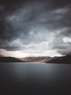 landscape photography of body of water, mountain, storm, cloud HD wallpaper