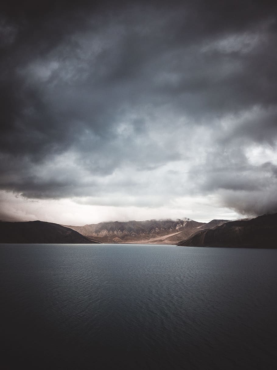 landscape photography of body of water, mountain, storm, cloud HD wallpaper