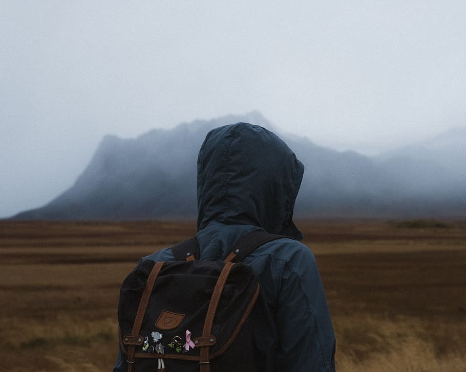 man carrying black knapsack, backpack, jacket, person, field HD wallpaper