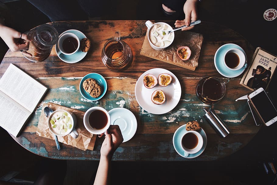 Person Sitting Near Table With Teacups and Plates, caffeine, cellphone HD wallpaper