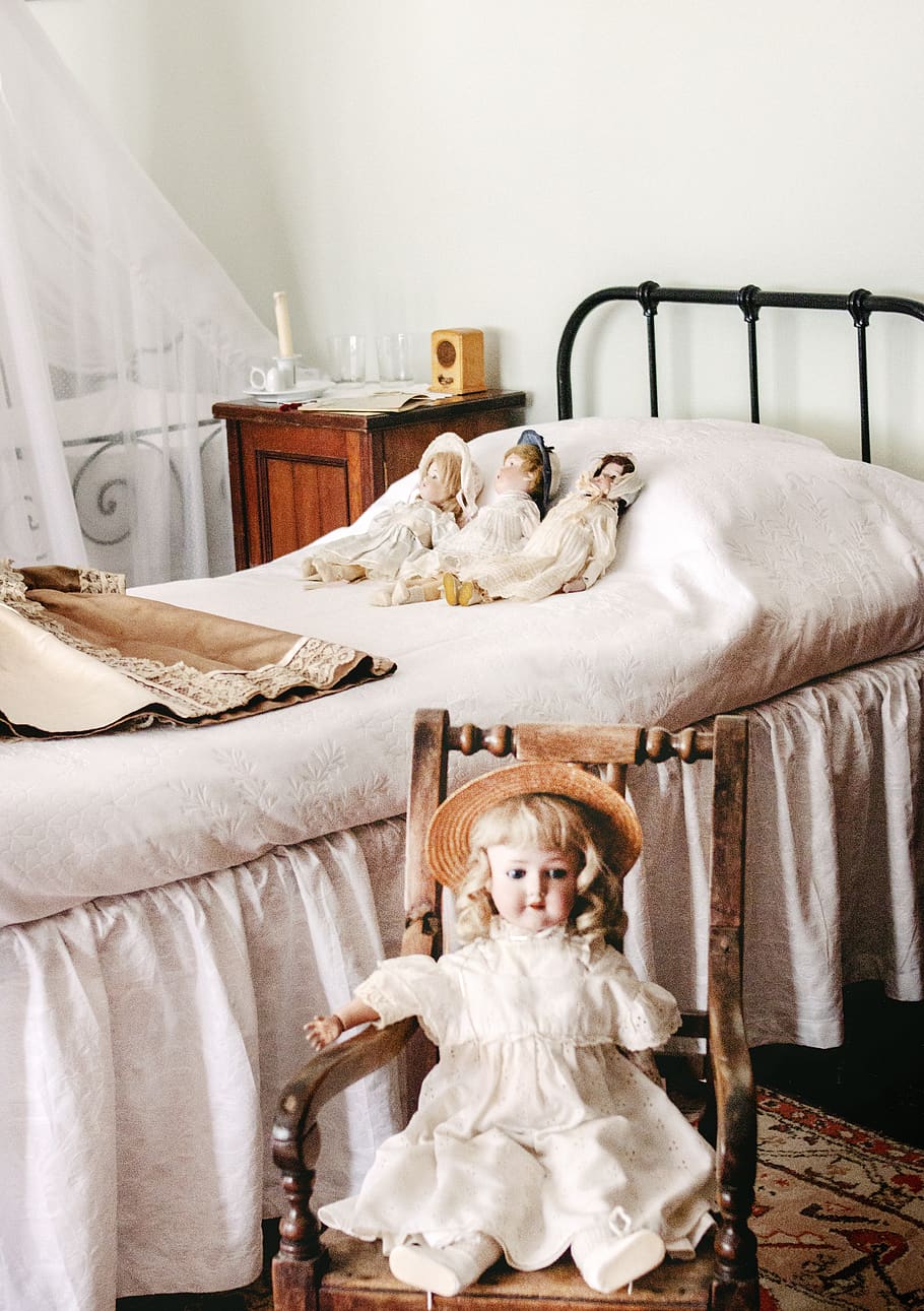 Three Dolls Lying on Bed, bedroom, bedsheet, blanket, chair, curtain HD wallpaper