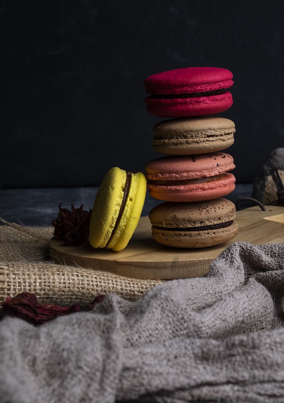 HD wallpaper: five yellow, red, pink, and brown French macaroons on coaster  | Wallpaper Flare