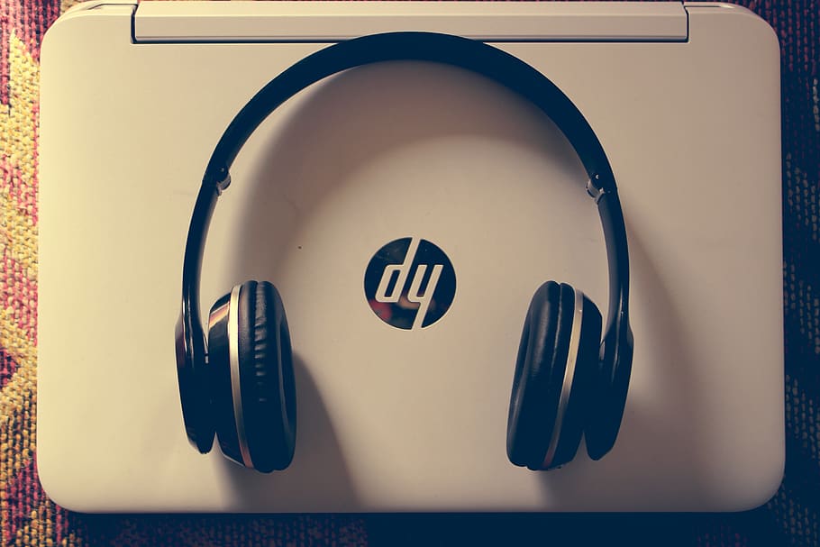 HD wallpaper: Black Wireless Headphone Near White Hp Laptop, black and  white | Wallpaper Flare