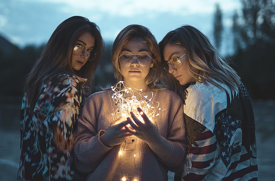 three women near string lights, young adult, lifestyles, togetherness HD wallpaper