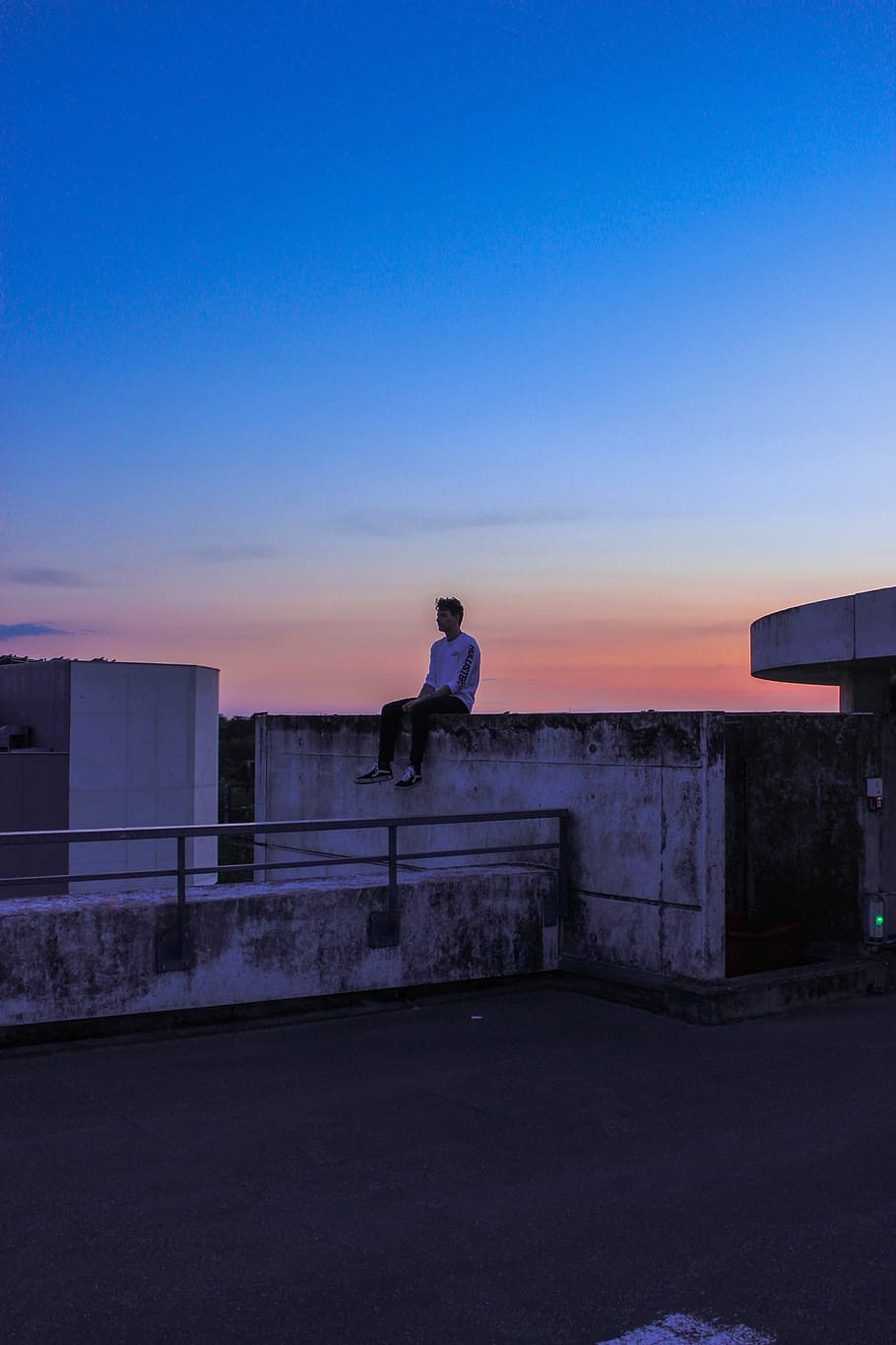 man sitting on concrete panel, human, person, silhouette, nature HD wallpaper