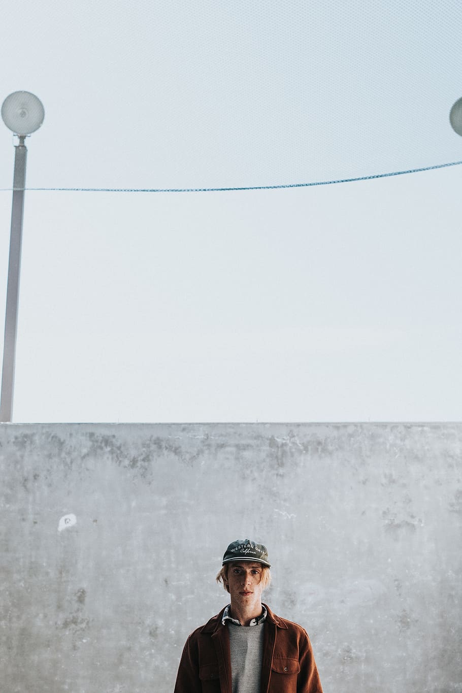 man in brown jacket, person, human, clothing, apparel, hat, cap HD wallpaper
