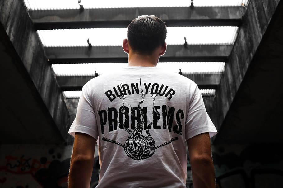 man standing under gray bridge, text, one person, rear view, casual clothing HD wallpaper