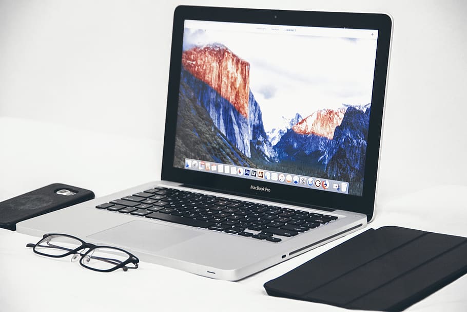 Macbook Air Beside Eyeglasses and Black Smart Case, connection HD wallpaper