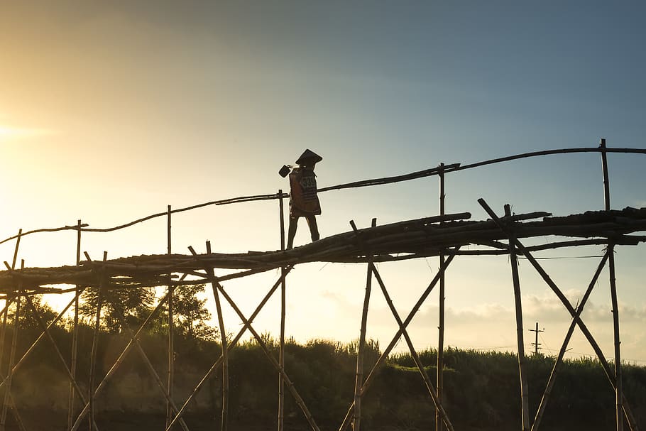 Photo of a Person Standing on Bridge, danger, dawn, dusk, environment HD wallpaper