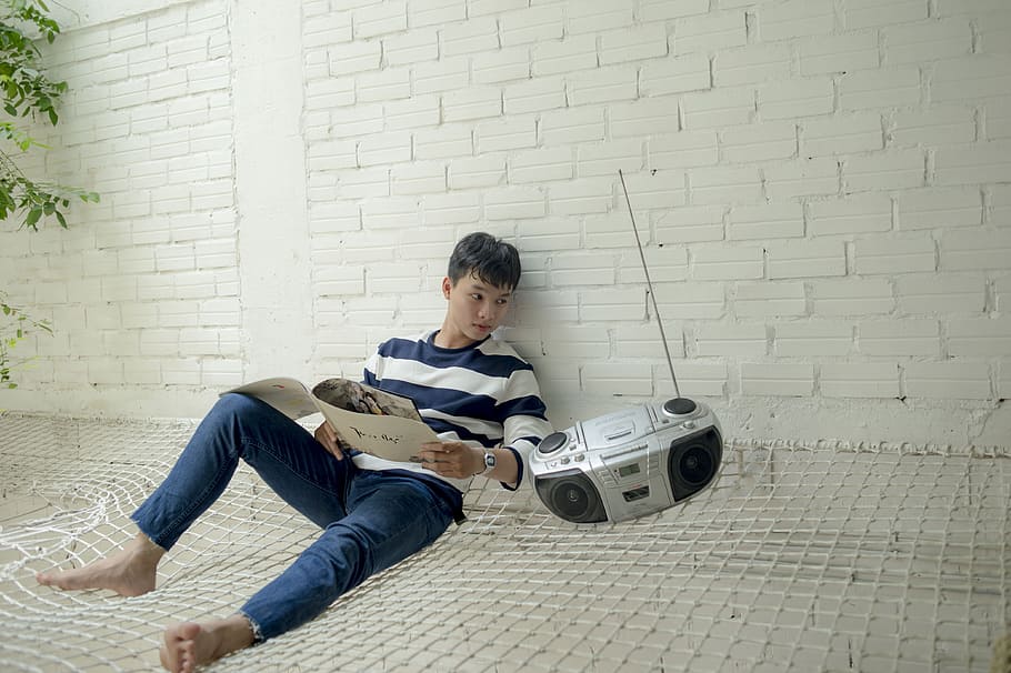 Boy Sitting Near Radio Holding White Catalog, Adobe Photoshop, HD wallpaper