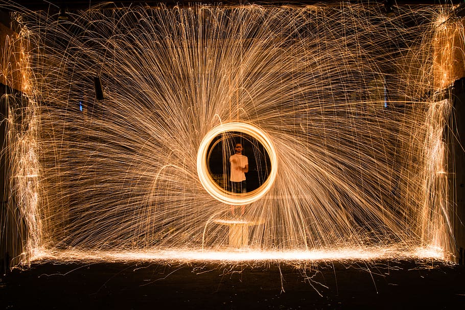 Yellow Sparks in Front of Person in White Top, art, artsy, background HD wallpaper