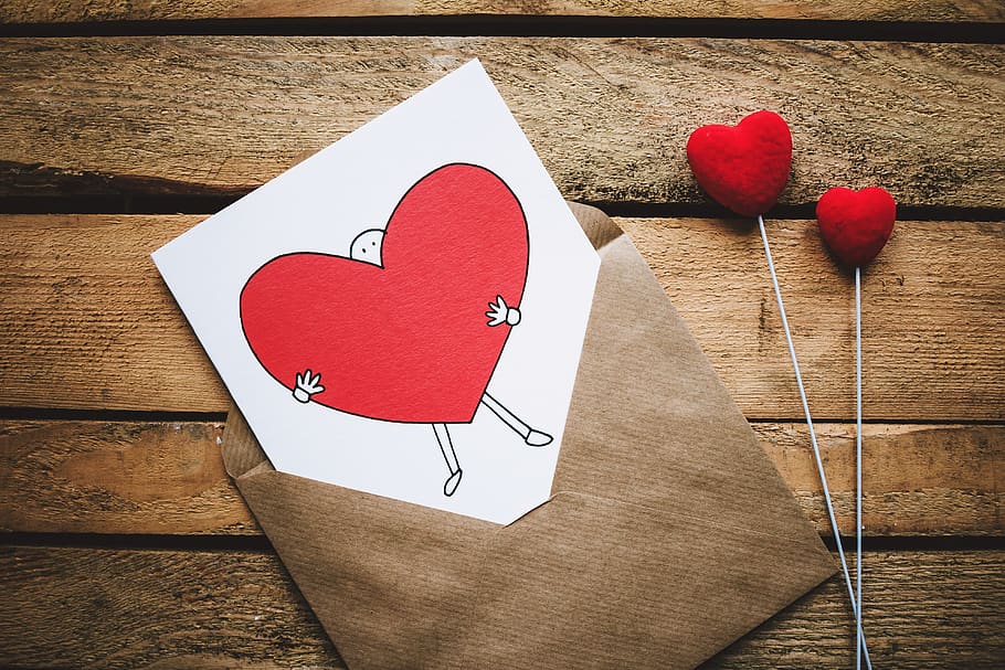 White, Black, and Red Person Carrying Heart Illustration in Brown Envelope HD wallpaper