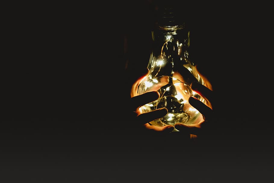 light bulb, lightbulb, glow, dark, hands on light, hands on light bulb HD wallpaper