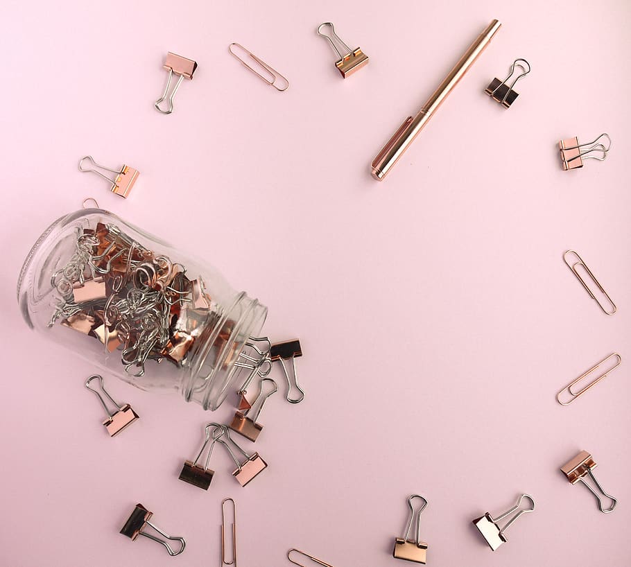 assorted-color folder clip lot on pink surface, indoors, large group of objects HD wallpaper