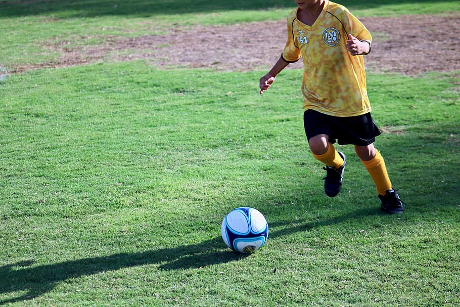 boy playing soccer, people, human, person, sports, football, team sport HD wallpaper