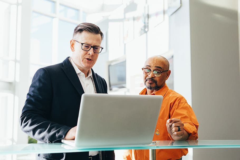 Man Using Silver Laptop Beside Another Man, business, computer HD wallpaper