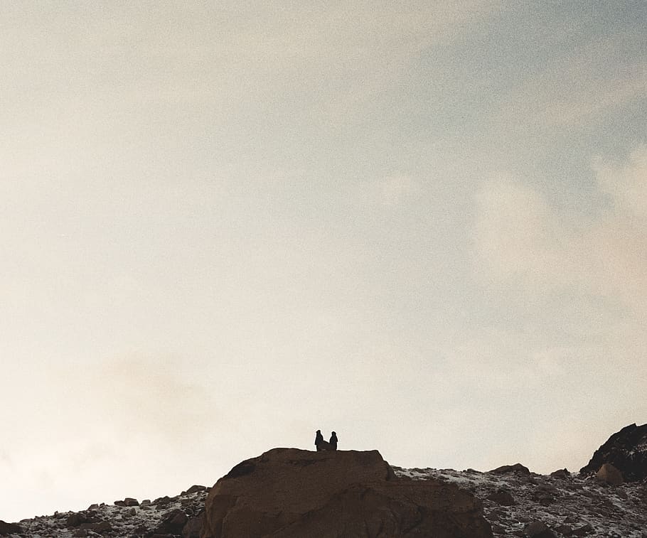 sky, sunshine, mountains, peak, cliff, one person, rock, nature HD wallpaper