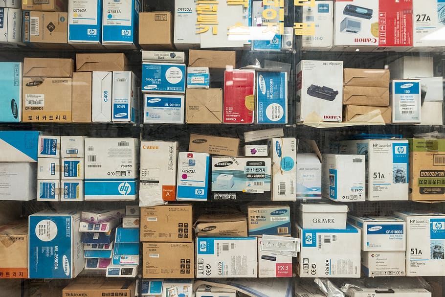 assorted boxes in shelves, full frame, large group of objects HD wallpaper