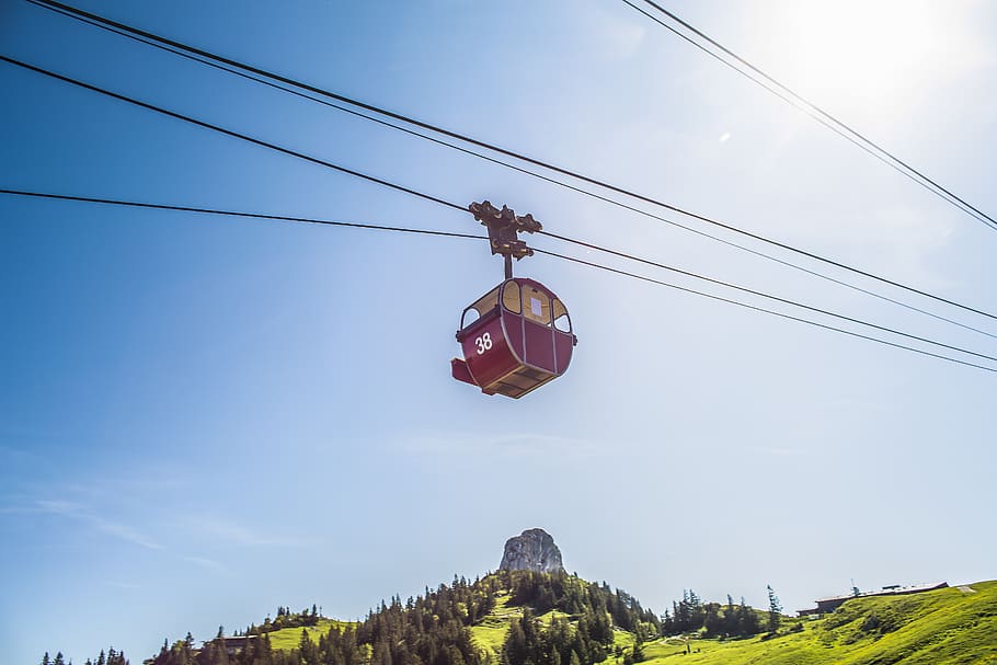 red cable car under sunlight, sky, low angle view, nature, hanging HD wallpaper