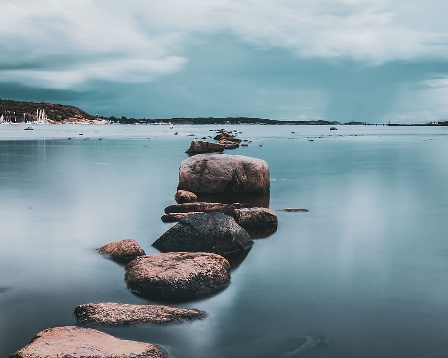 brown rock pathway between calm lake, water, scenics - nature HD wallpaper