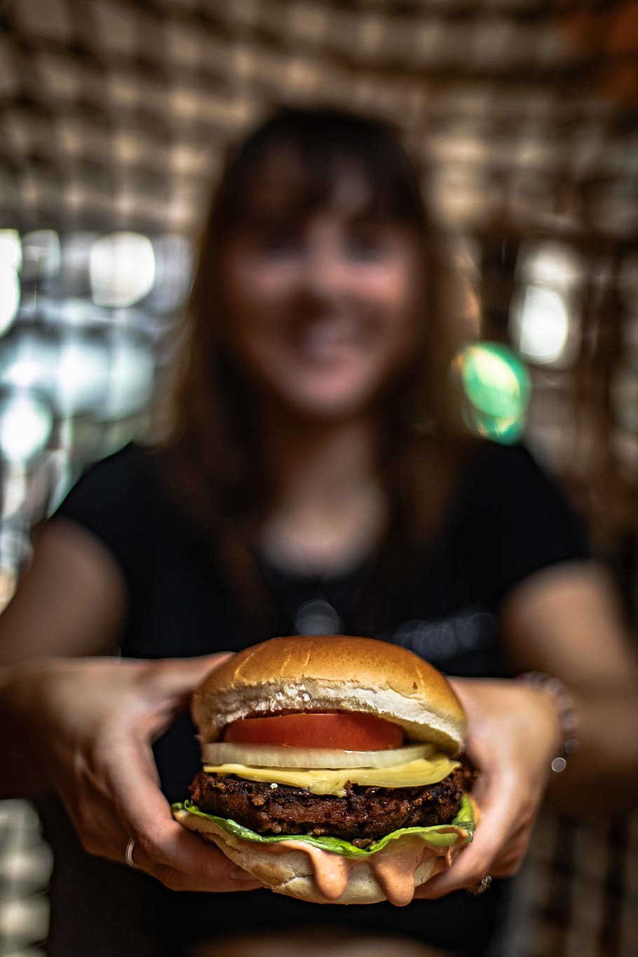 selective focus photography of burger, food, person, human, bread