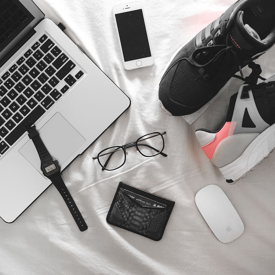 black framed eyeglasses surrounded with assorted-color items HD wallpaper
