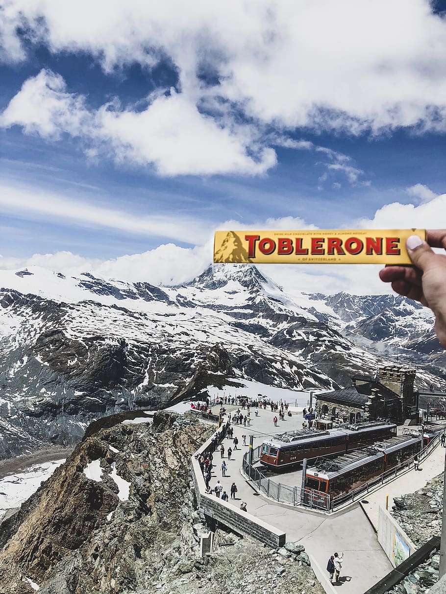 person holding Toblerone chocolate box, cold temperature, snow, HD wallpaper