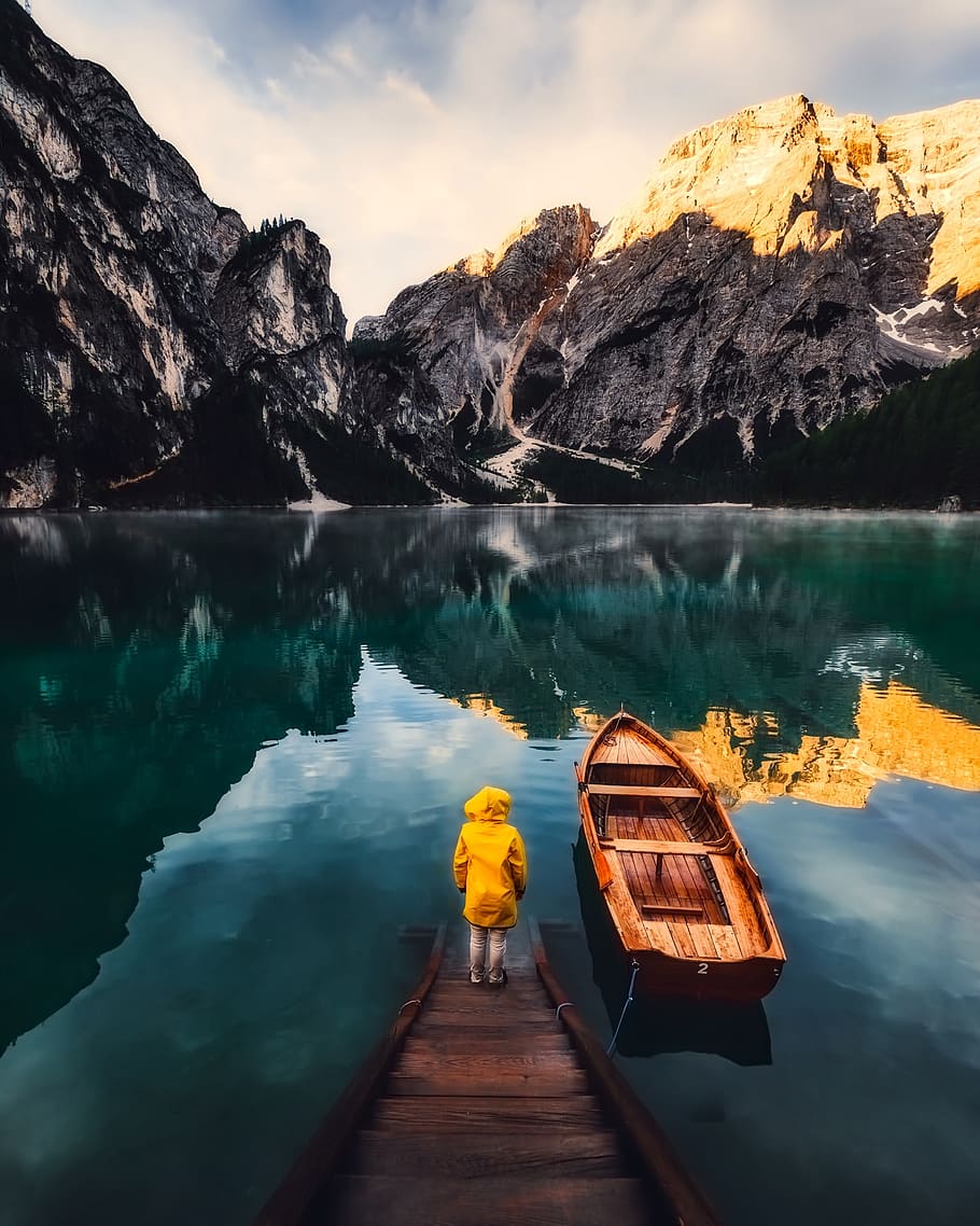 Person Standing on Dock Beside Boat and Water, back view, canoe HD wallpaper