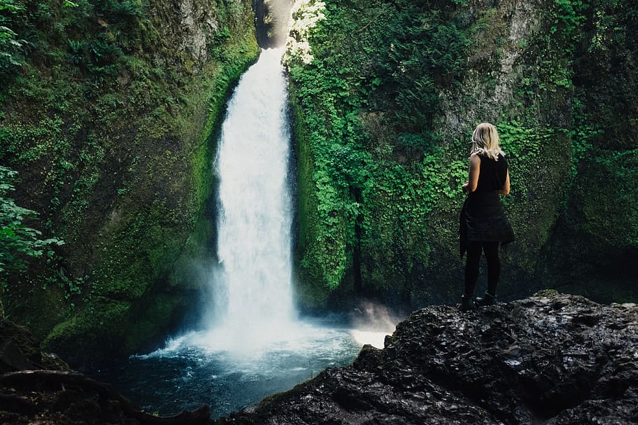 woman in front of waterfalls, one person, scenics - nature, standing