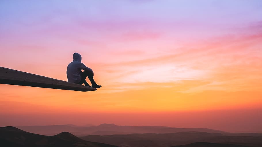 man sitting on plank, sunset, one person, silhouette, sky, full length HD wallpaper