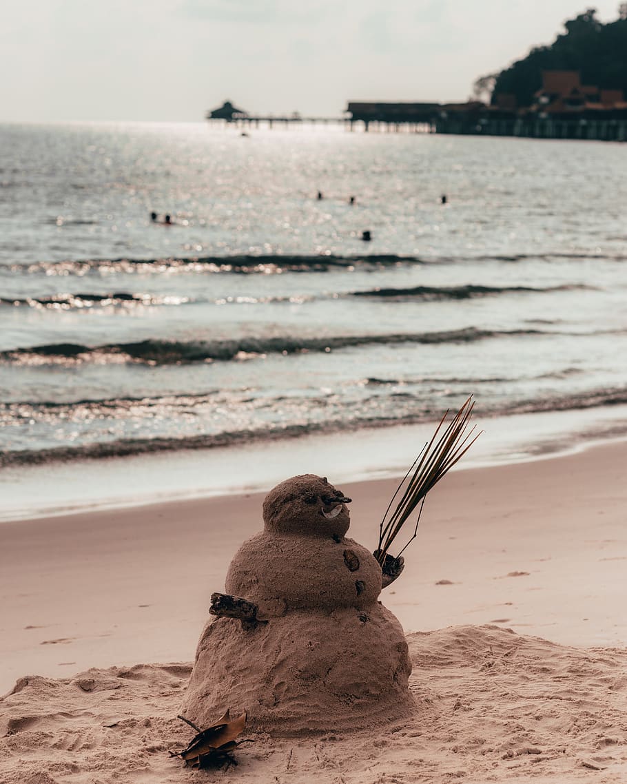 sandman beside sea on shore, snowman, winter, outdoors, nature HD wallpaper