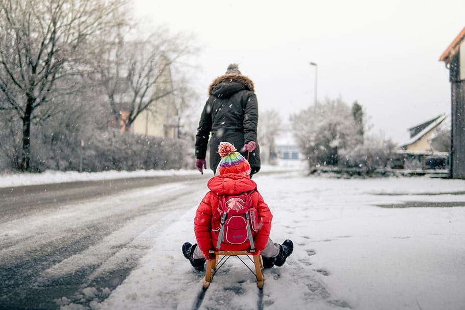 person pulling cart with boy, sled, winter, snow, nature, germany HD wallpaper