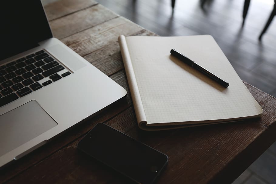macbook, laptop, computer, table, notepad, graph paper, pen HD wallpaper