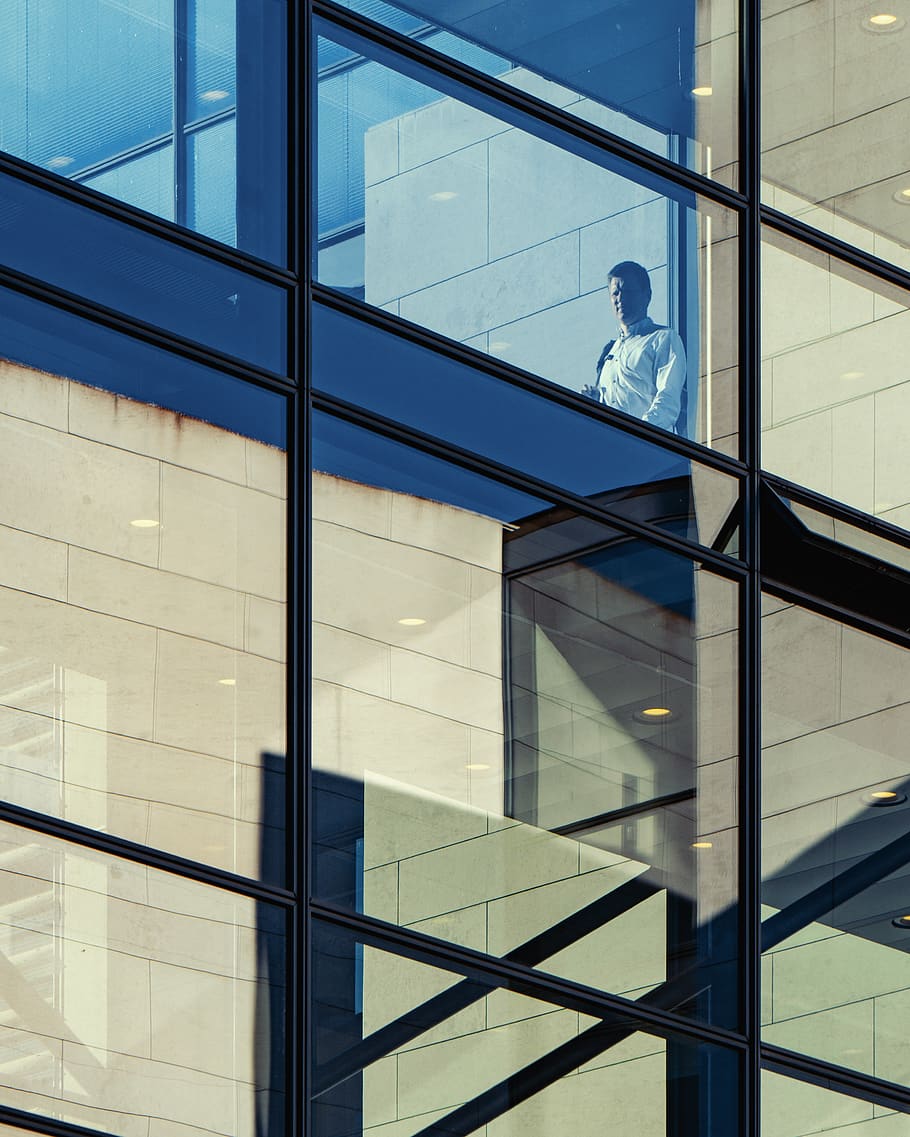 man standing inside concrete building, architecture, built structure HD wallpaper