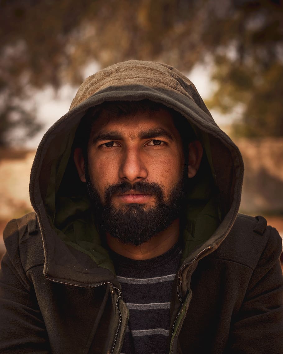 man wearing black hooded jacket, beard, portrait, facial hair HD wallpaper