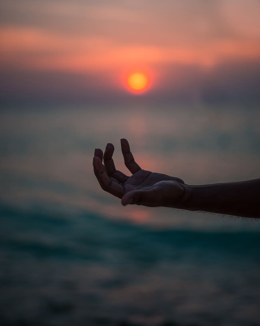 human hand near body of water, person, finger, outdoors, nature