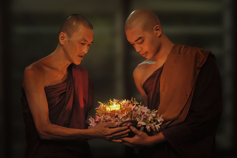 Two Man Monks Holding Light, blur, buddha, Buddhism, candle, ceremony, HD wallpaper